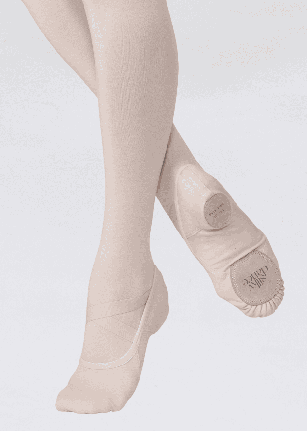 Pink canvas ballet shoes worn with ballet tights